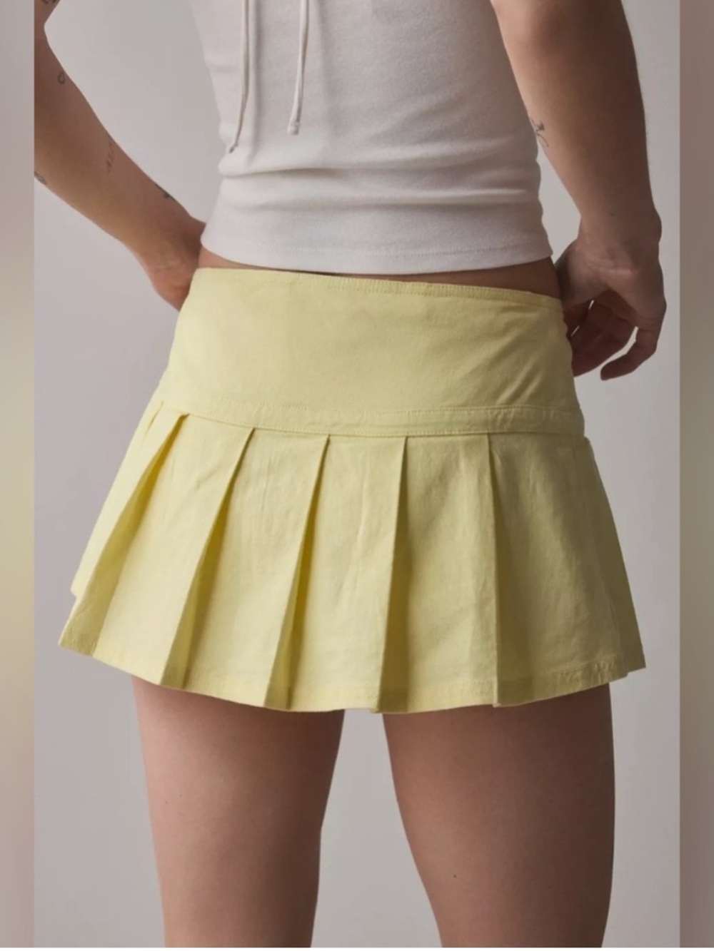 BDG Pale Yellow Pleated Mini Skirt with Side Buckle - Picture 2 of 3